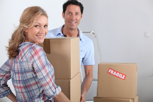 Professional movers protecting fragile items during a Chiswick move